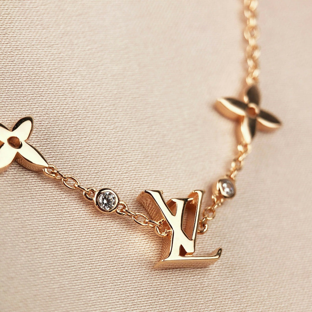 [Clover]STAR AND SUN 7 MOTIFS GOLD BRACELET