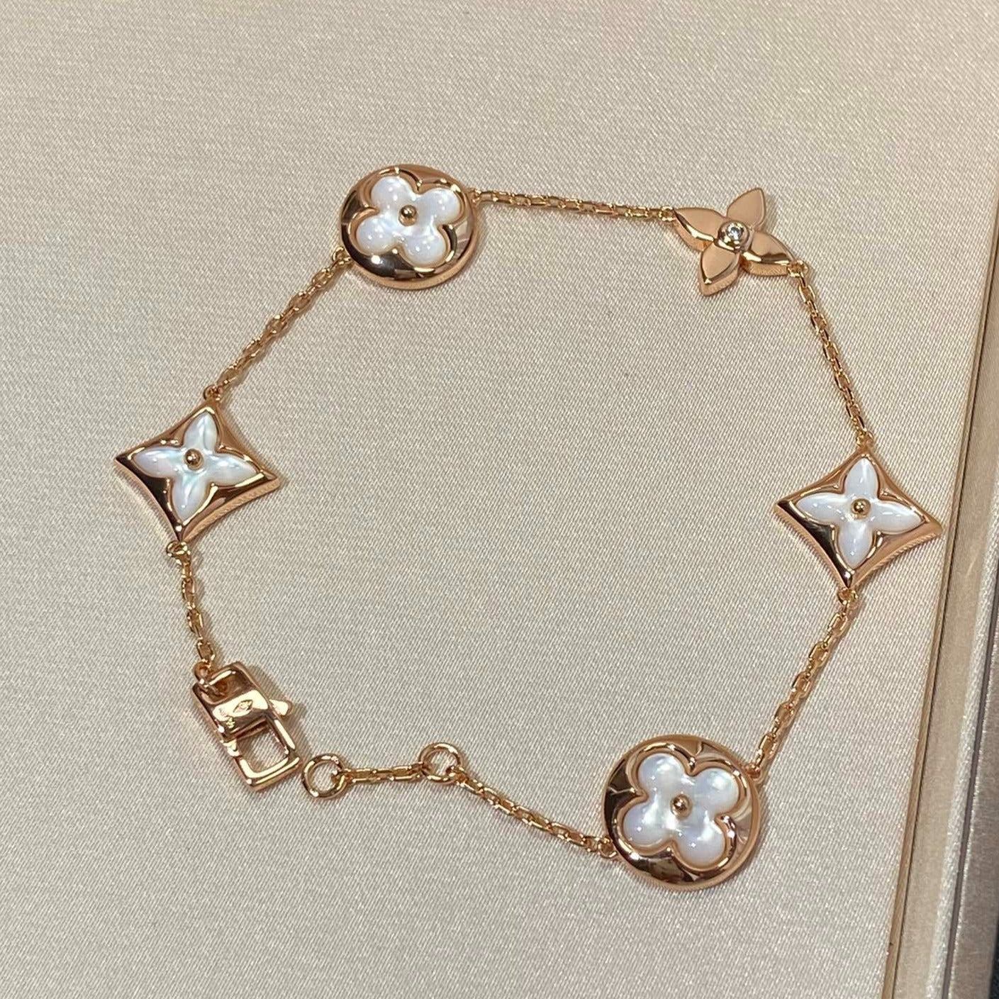 [Clover]STAR AND SUN 5 MOTIF MOP PINK GOLD BRACELET