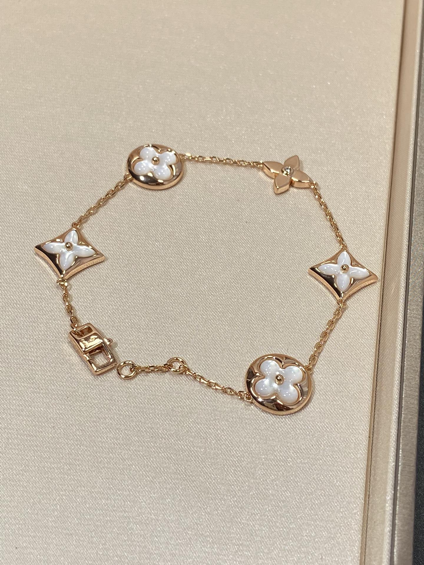 [Clover]STAR AND SUN 5 MOTIF MOP PINK GOLD BRACELET