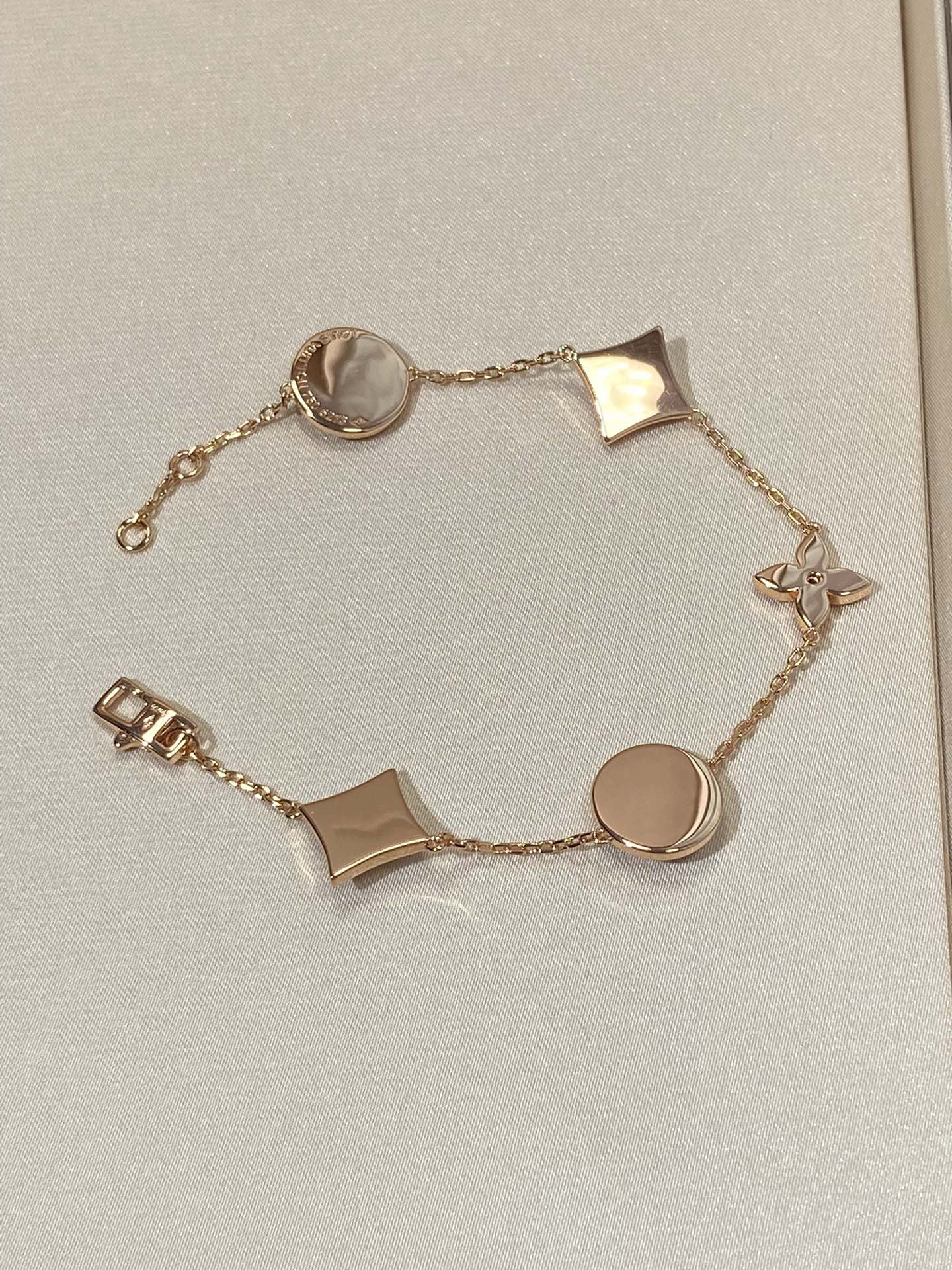 [Clover]STAR AND SUN 5 MOTIF MOP PINK GOLD BRACELET