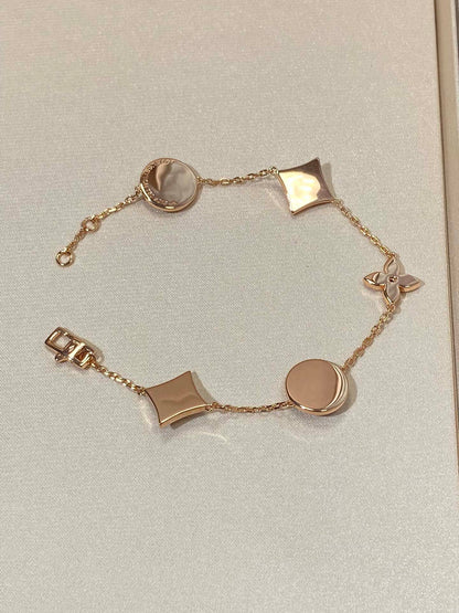 [Clover]STAR AND SUN 5 MOTIF MOP PINK GOLD BRACELET
