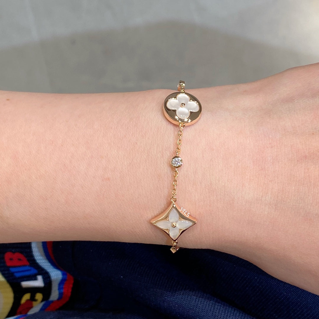 [Clover]STAR AND SUN 4 MOTIF WHITE MOP PINK GOLD BRACELET